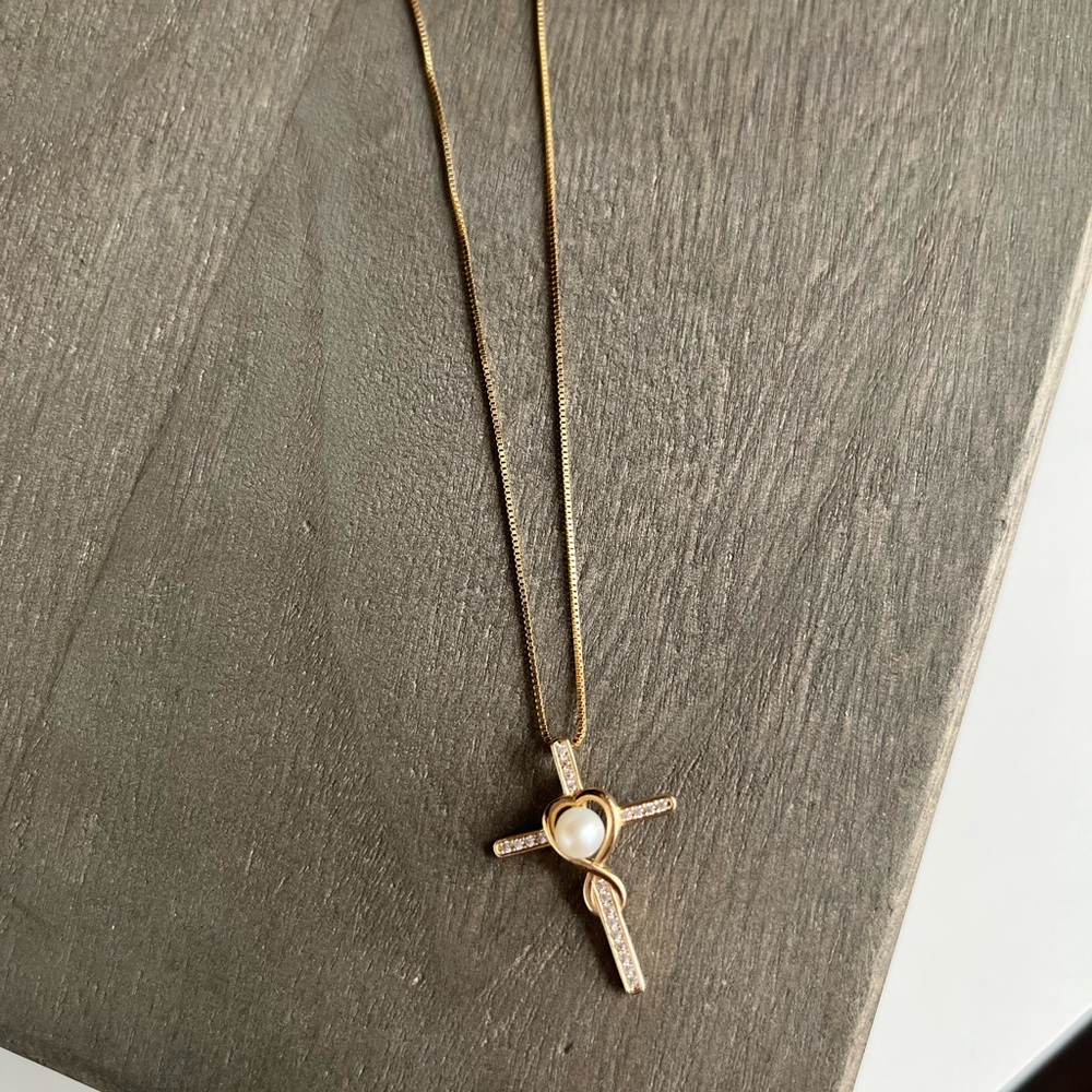 14kt yellow gold cross with pearl pendant and 14kt gold 18” chain